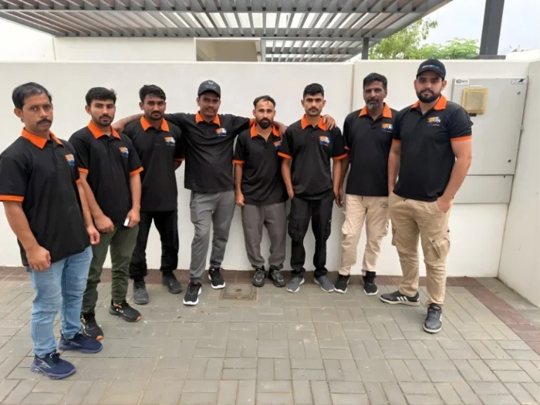MK Movers and Packers professional moving team in Dubai uniforms